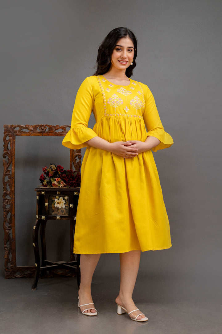 Yellow Cotton Blend Yoke Embroidered Maternity Dress