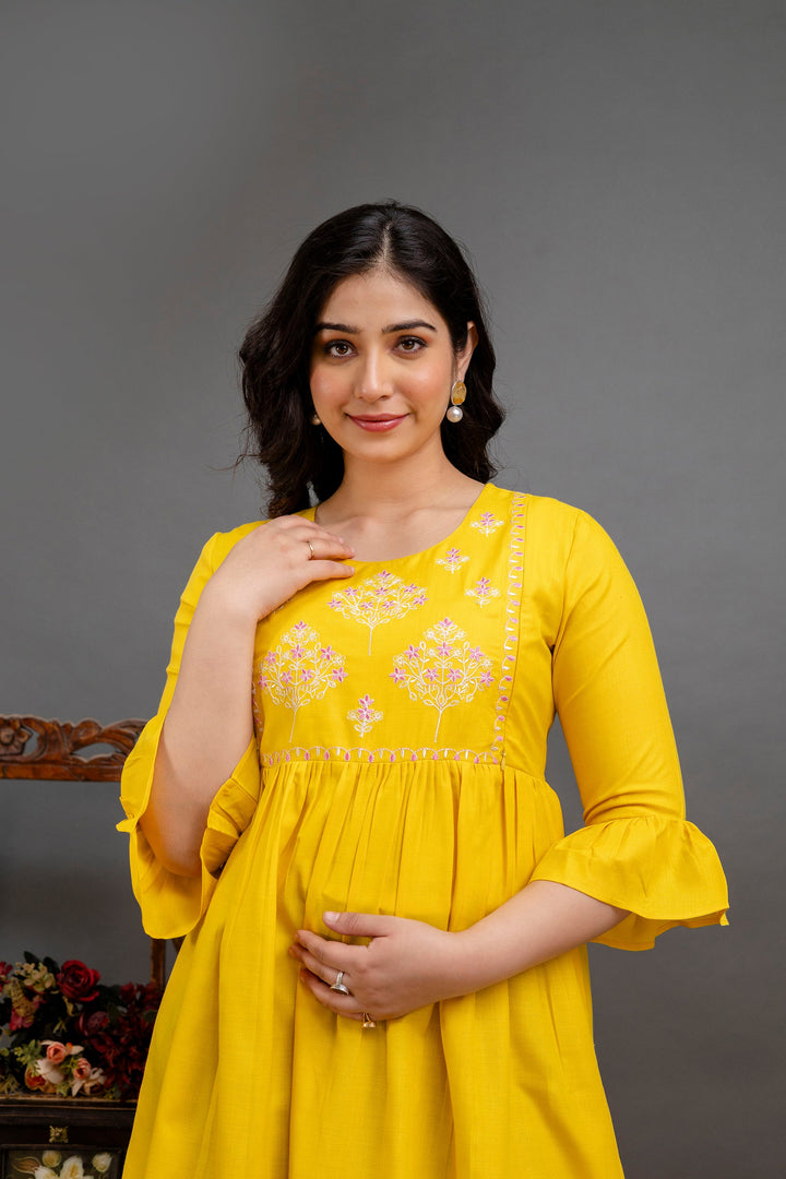 Yellow Cotton Blend Yoke Embroidered Maternity Dress