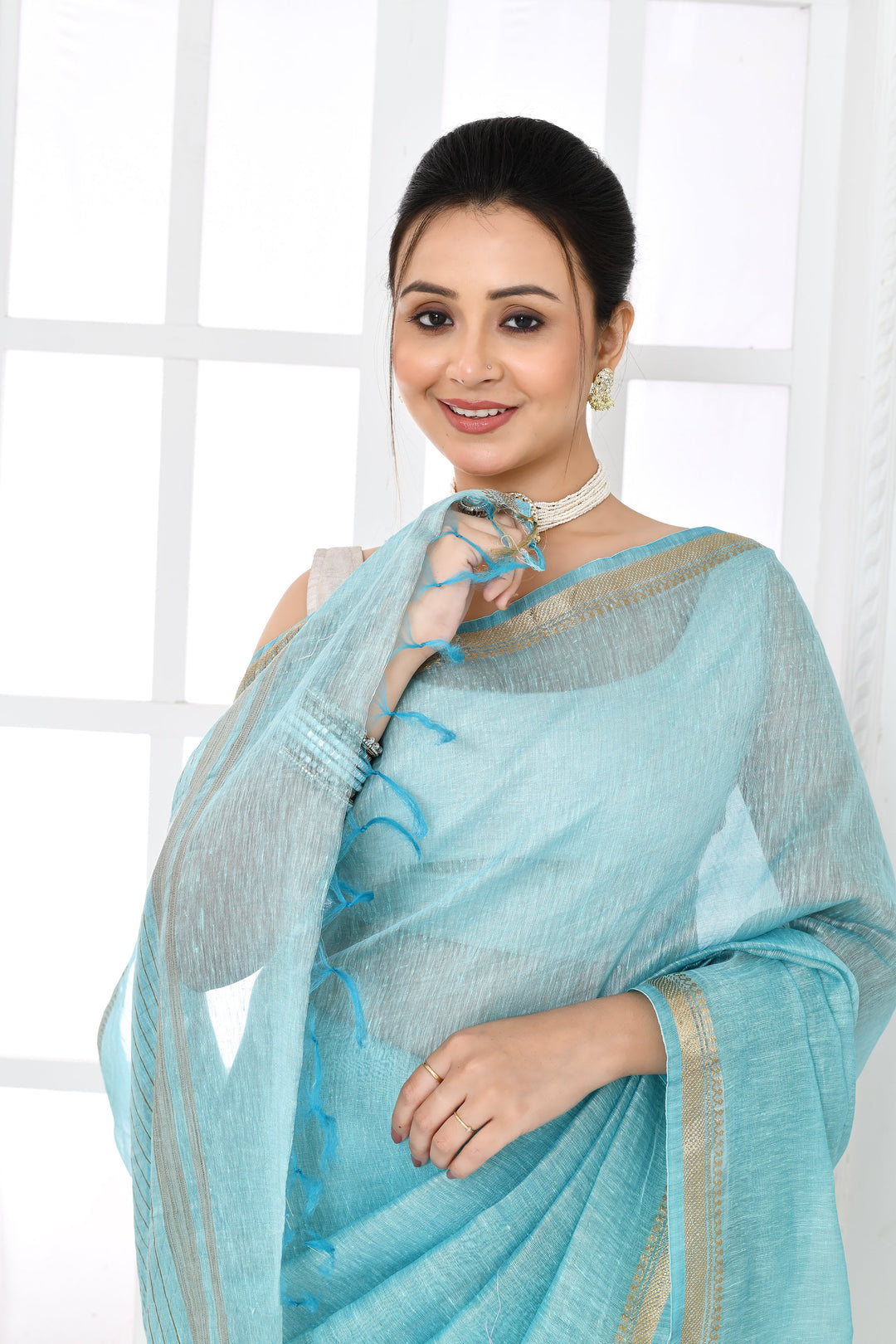 Aqua-Blue-Tussar-Linen-Handloom-Saree-With-Embroidered-Blouse