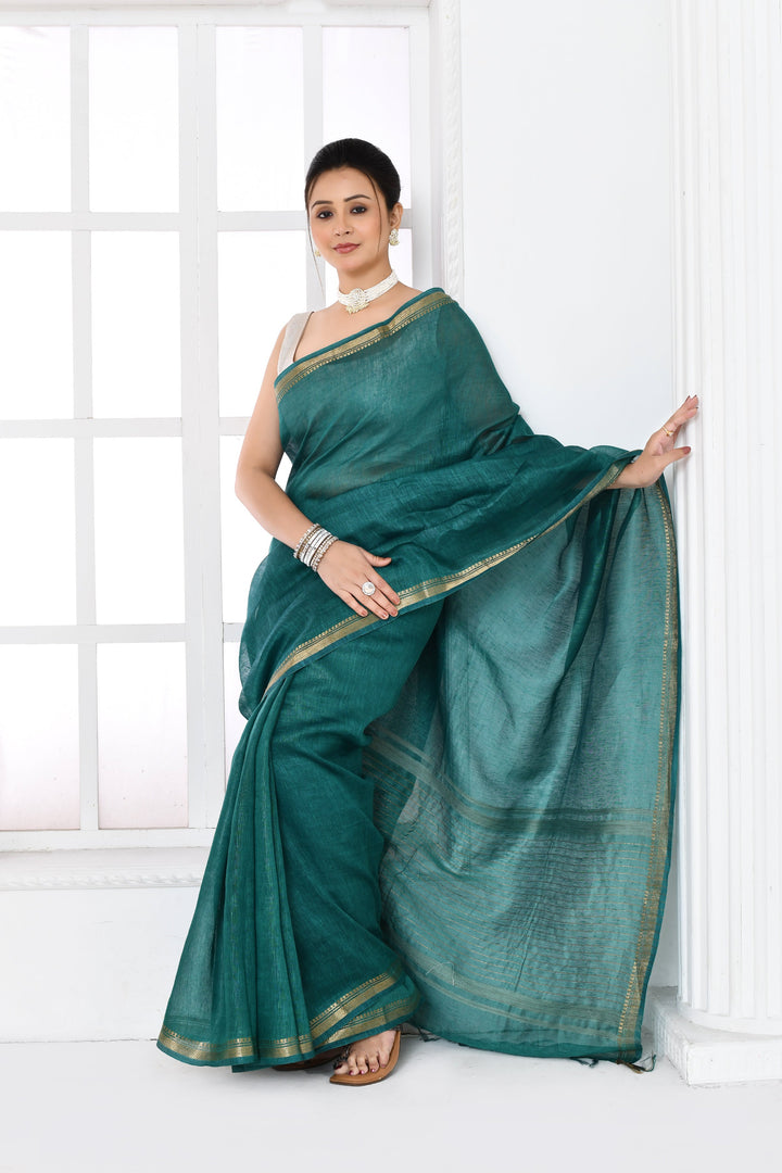 Bottle-Green-Tussar-Linen-Handloom-Saree-With-Embroidered-Blouse