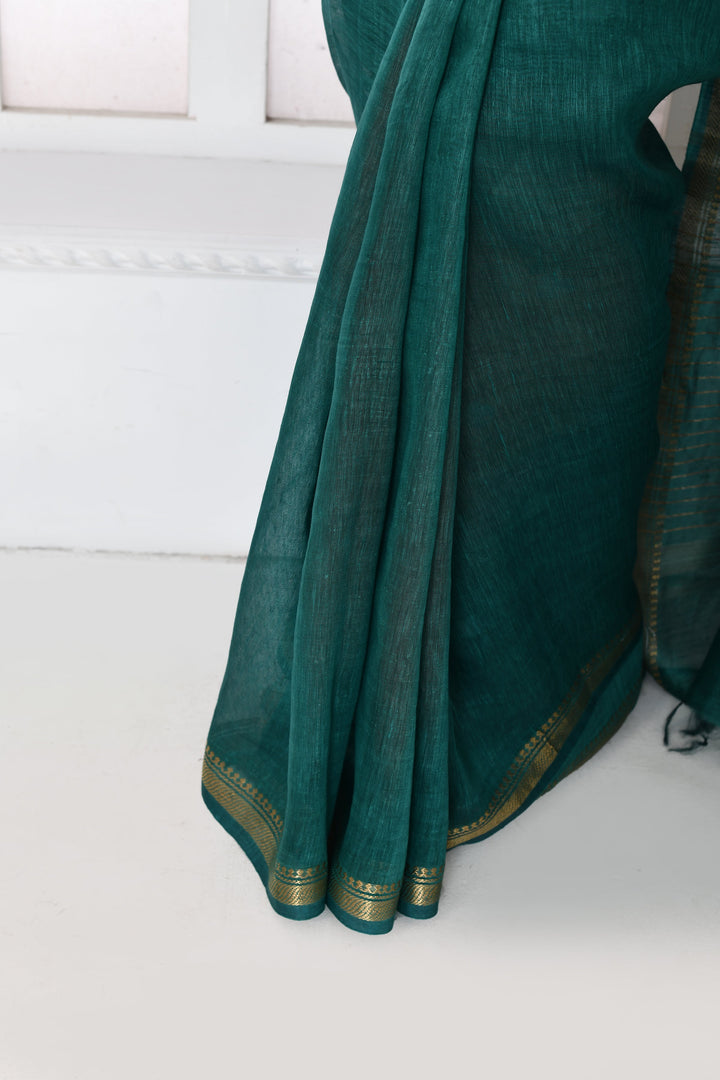 Bottle-Green-Tussar-Linen-Handloom-Saree-With-Embroidered-Blouse