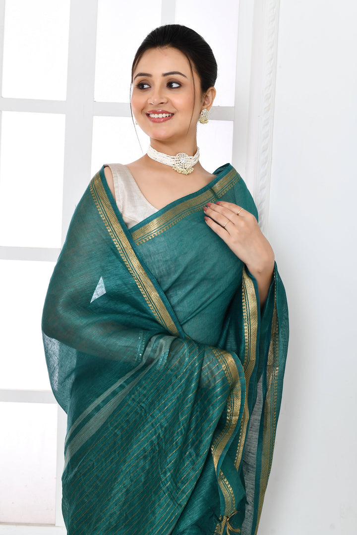 Bottle-Green-Tussar-Linen-Handloom-Saree-With-Embroidered-Blouse