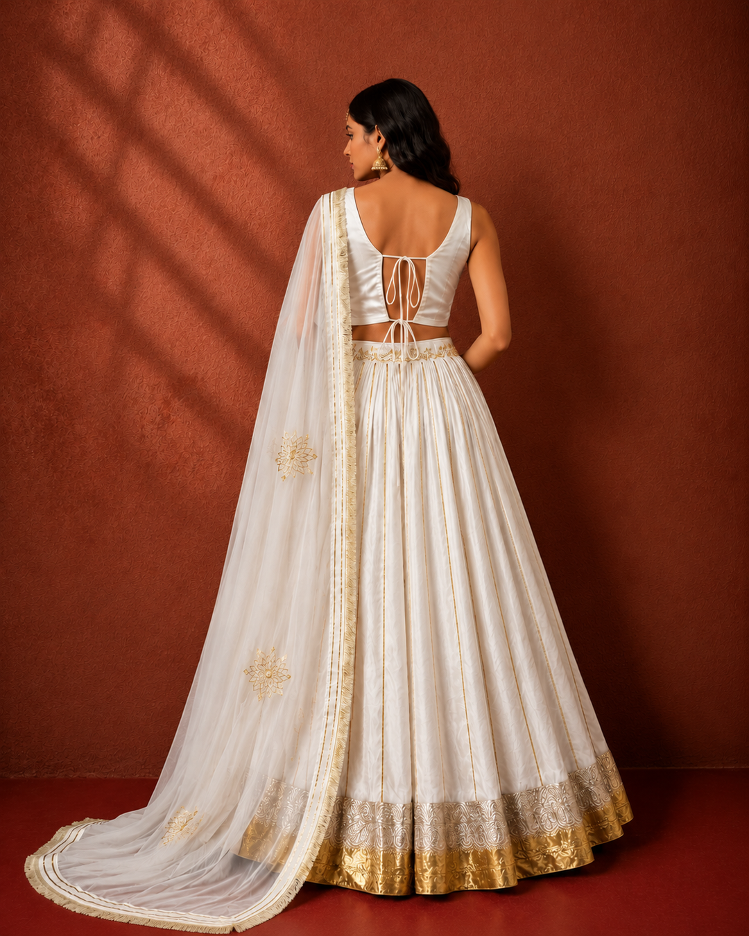 Off White Silk Sleeveless Lehenga Set