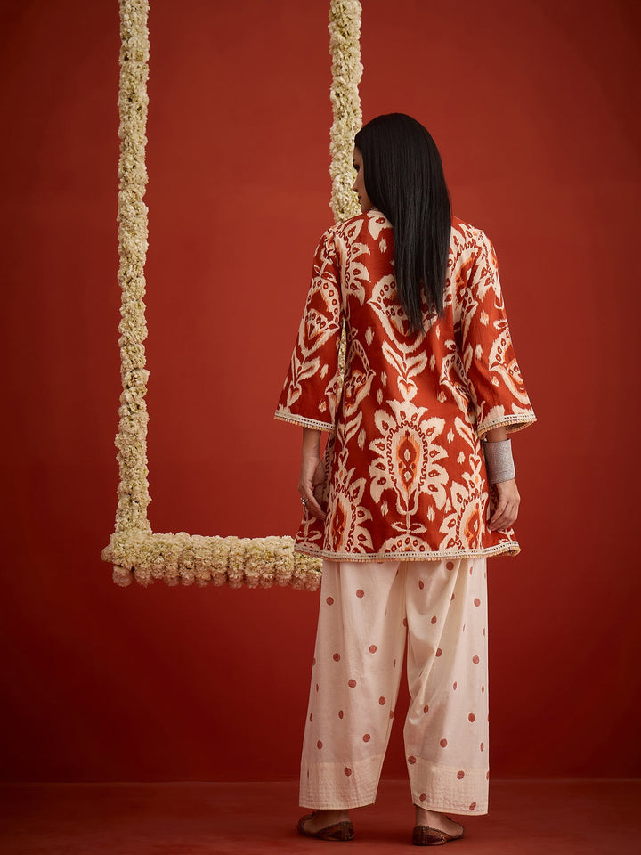 Rust Ikat Printed & Embroidered Cotton A-Line Short Kurti With Farshi Slawar Set