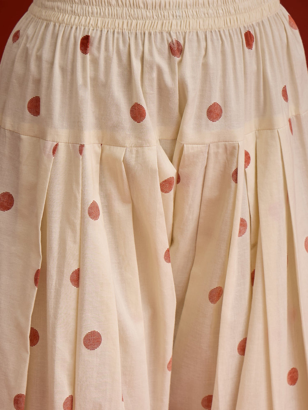 Rust Ikat Printed & Embroidered Cotton A-Line Short Kurti With Farshi Slawar Set