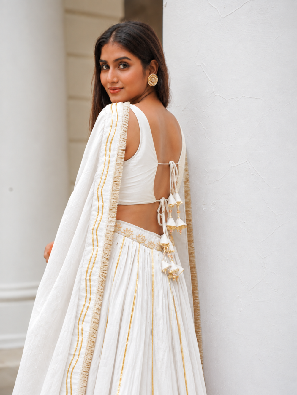 Off White Silk Sleeveless Lehenga Set