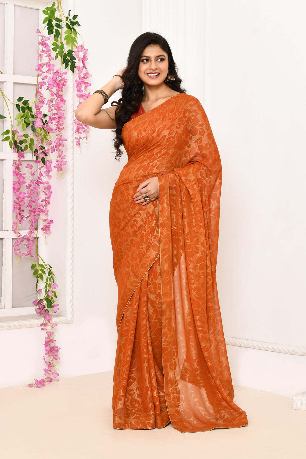 Orange-Chiffon-Tissue-Saree-With-Golden-Self-Print