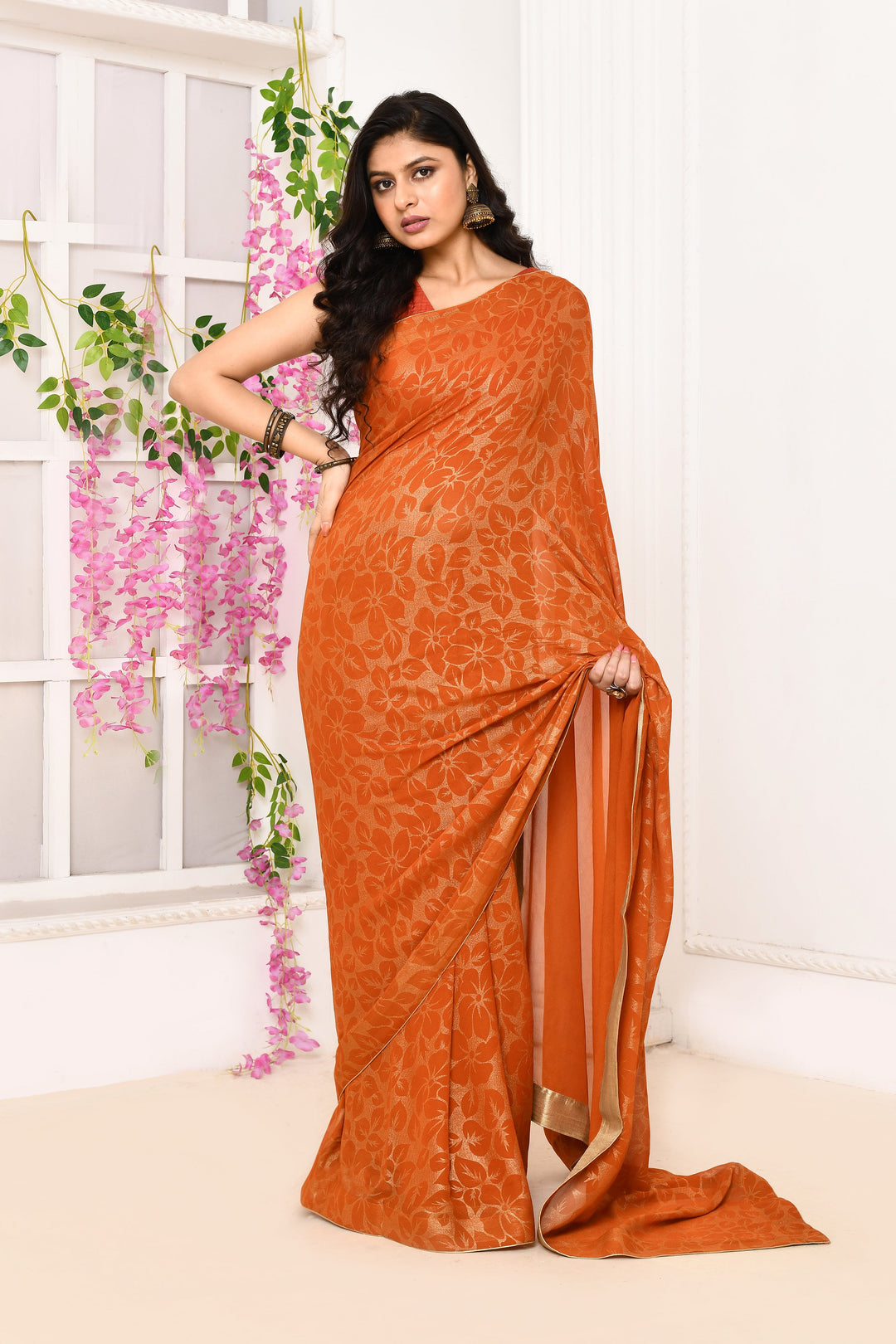 Orange-Chiffon-Tissue-Saree-With-Golden-Self-Print