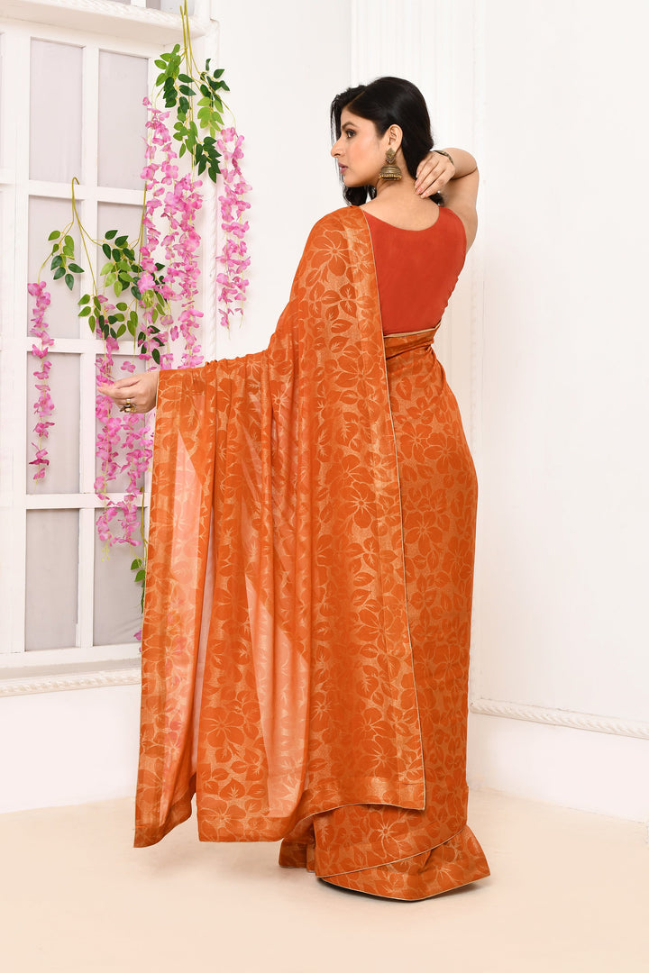 Orange-Chiffon-Tissue-Saree-With-Golden-Self-Print