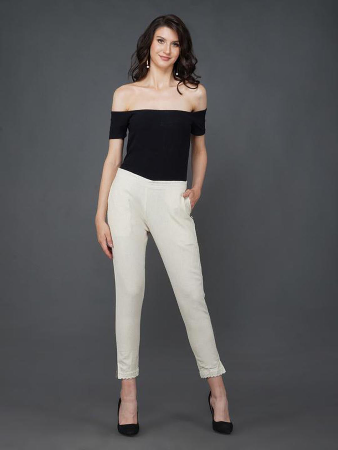 Off White Pant With Lace Work At Hem