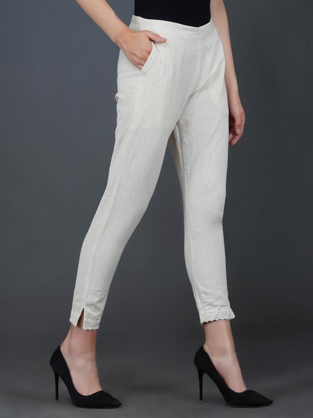 Off White Pant With Lace Work At Hem