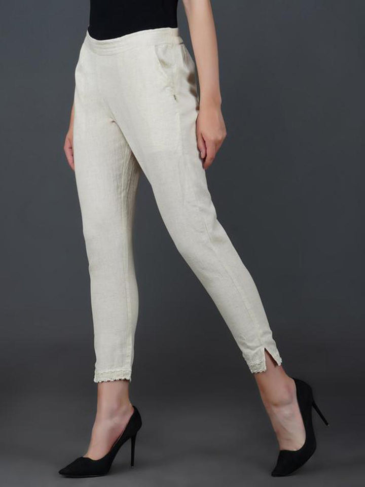 Off White Pant With Lace Work At Hem