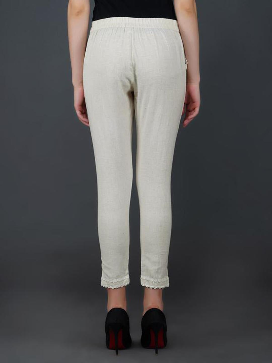 Off White Pant With Lace Work At Hem