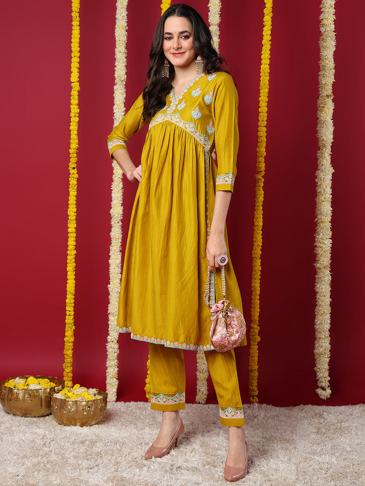 Yellow Silk Blend Solid Embroidered Flared Kurta with Trouser