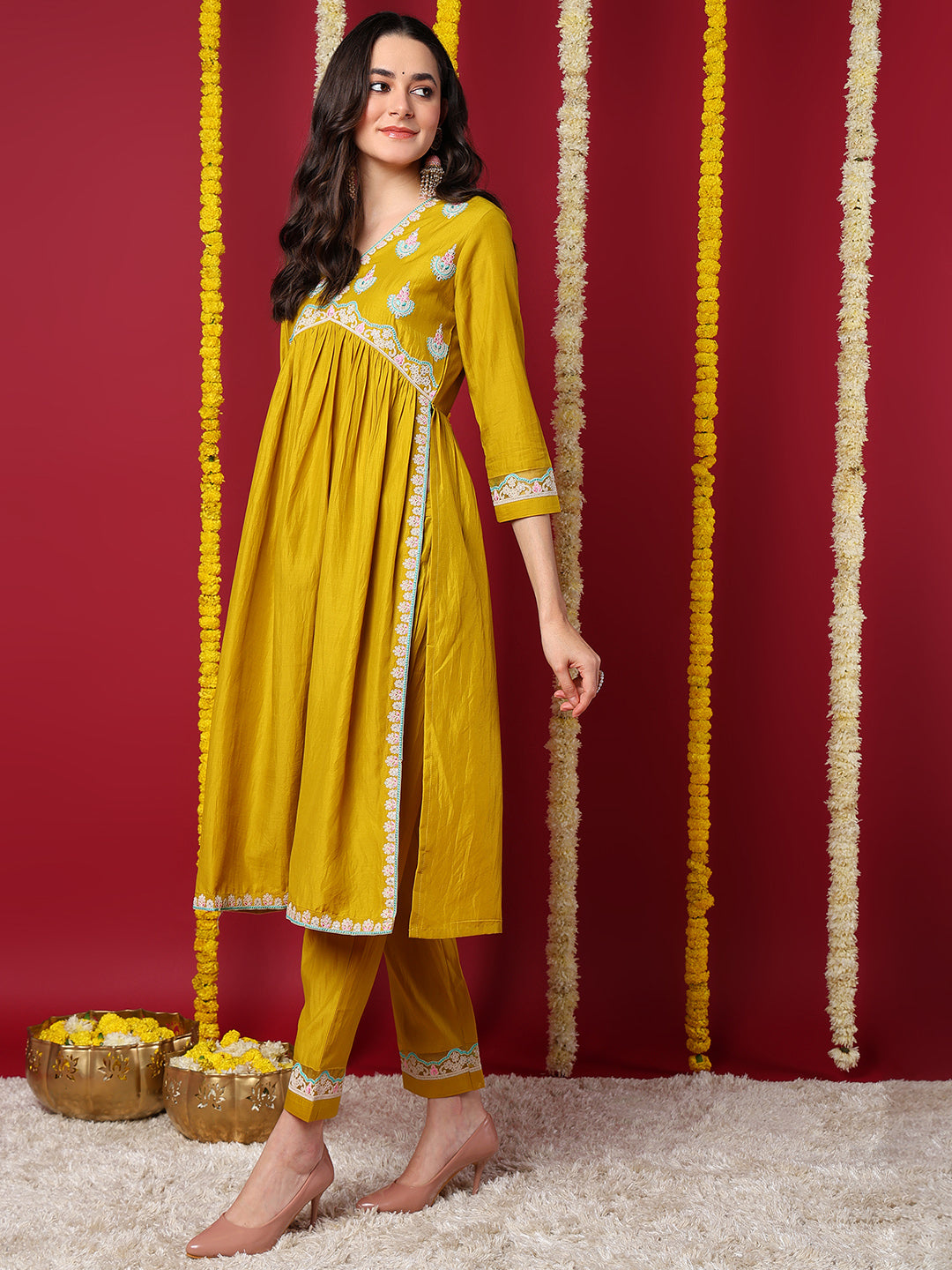 Yellow Silk Blend Solid Embroidered Flared Kurta with Trouser